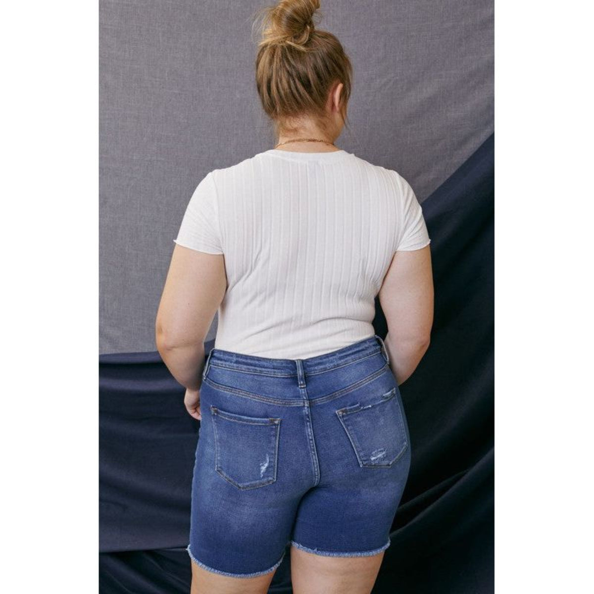 High rise button-down blue jean skinny shorts; womens clothing.