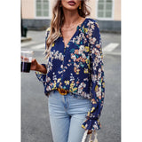 Blue floral button down long sleeve blouse; womens apparel.