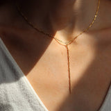 Gold plated dot and dash necklace; accessory and gift. 