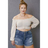 High rise distressed button-up denium shorts; womens clothing.