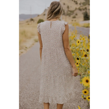 Long white dress with colorful floral print. - SLATE boutique & Gifts 