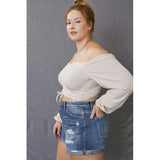 High rise distressed button-up denium shorts; womens clothing.