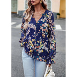 Blue floral button down long sleeve blouse; womens apparel.