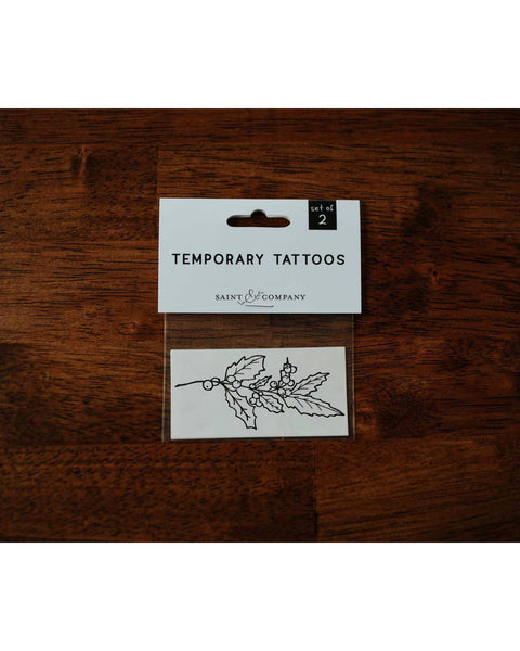 Black ink Holly temporary tattoo.