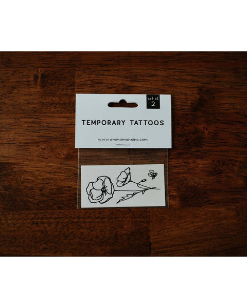 Black ink temporary Poppy tattoo for August birth month.